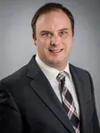 Photo of Carl Frederic Cooper, Defendant Lawyer