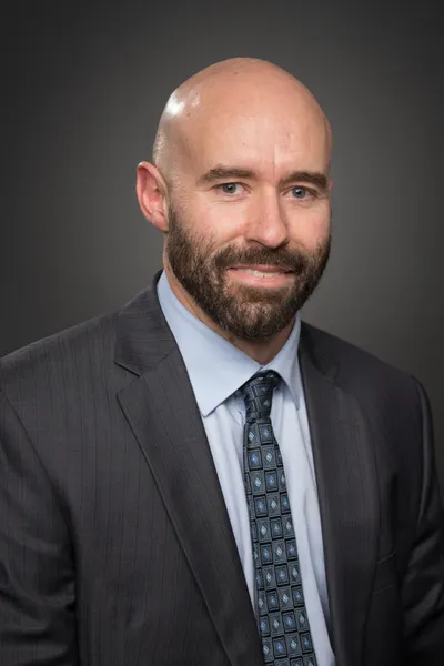 Photo of Justin Kai Romig, Defendant Lawyer