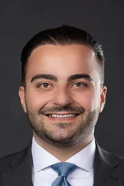 Photo of Khamo Koro Esho, Plaintiff Lawyer