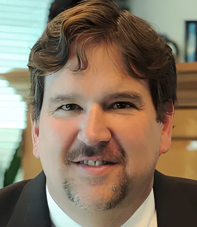 Photo of Earl E. Debrine, Plaintiff Lawyer