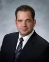 Photo of Dennis P. Popojas, Defendant Lawyer